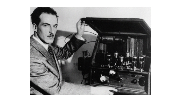 Leon Theremin with his invention